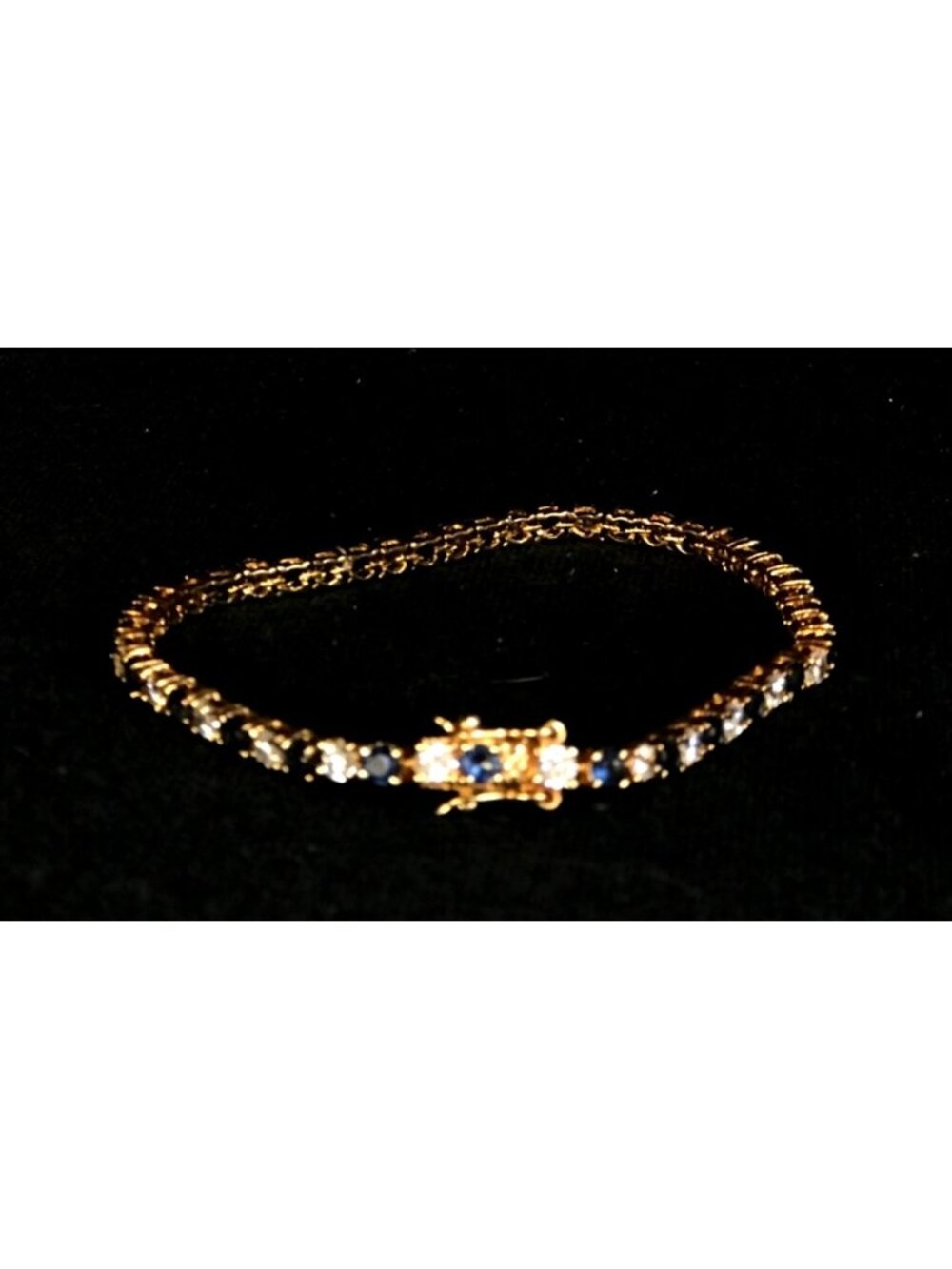 Gold Tone Tennis Bracelet with Blue and Clear Rhinestones with Safety Lock - Picture 5 of 6